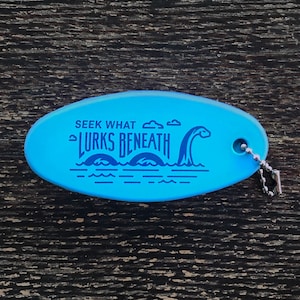 Cryptid Addiction - Loch Ness Monster Floating Boat Keychain