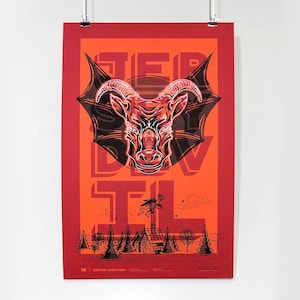 May include: A red and black poster with the text "The Devil" in a stylized font. A red, horned, demonic creature with bat wings is in the center of the poster.