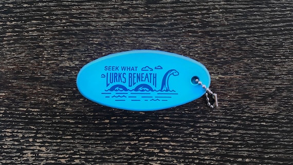 Cryptid Addiction - Loch Ness Monster Floating Boat Keychain
