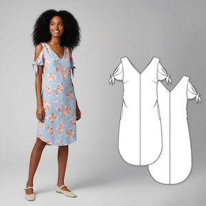 May include: A light blue floral print dress with a V-neck and shoulder ties. The dress features a knee-length hemline and is worn with beige flats. A line drawing of the dress pattern is also shown.