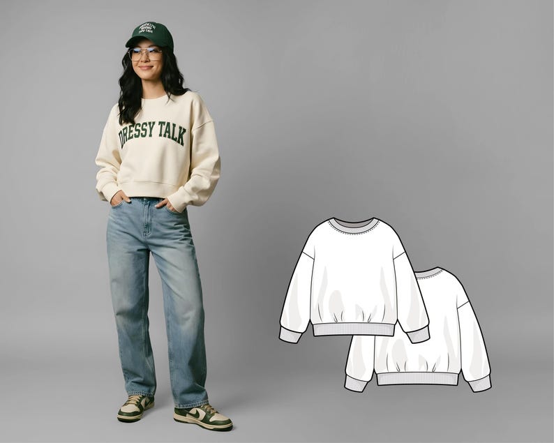 May include: A woman wearing a cream-colored sweatshirt with the text "DRESSY TALK" in green, paired with light blue jeans and a green cap. The image also shows a pattern of a white sweatshirt.