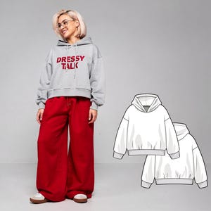 Könnte beinhalten: Eine Person trägt einen grauen Kapuzenpullover mit dem roten Text "DRESSY TALK", kombiniert mit einer roten Hose mit weitem Bein. Das Bild enthält auch eine Strichzeichnung eines weißen Hoodies.