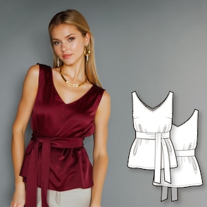 May include: A sleeveless, claret satin top with a V-neck and a matching waist tie. The top is paired with light-coloured trousers. A gold necklace and earrings complete the look. A pattern of the top is also shown.