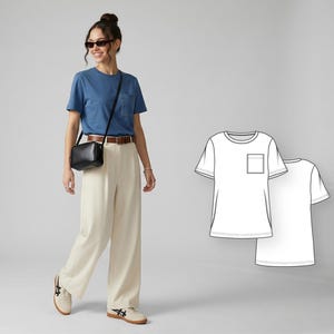 May include: A woman wearing a blue t-shirt with a chest pocket, cream-colored pants, and a black crossbody bag. The outfit is paired with sneakers. A line drawing of the t-shirt is shown on the right.