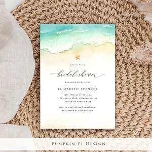 Puede incluir: Una invitación a una despedida de soltera con una escena de playa en acuarela. La invitación incluye el texto "bridal shower" y los detalles de la fiesta de Elizabeth Spencer, incluyendo fecha, hora y lugar.