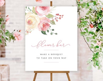 May include: A white sign with a floral design in pink and yellow watercolor. The sign says "flower bar" and "make a bouquet to take on your way".