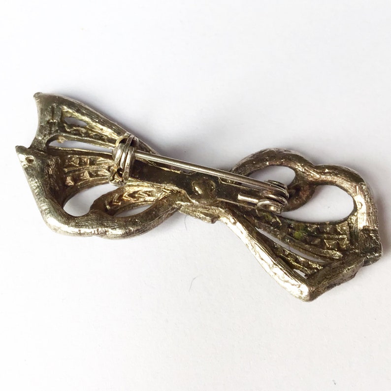 Vintage mid century faux marcasite bow brooch.