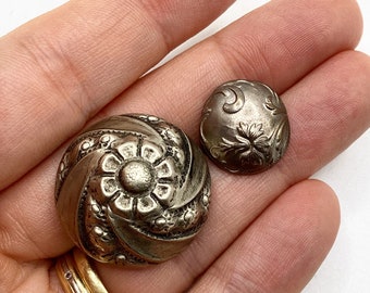 Two antique floral buttons