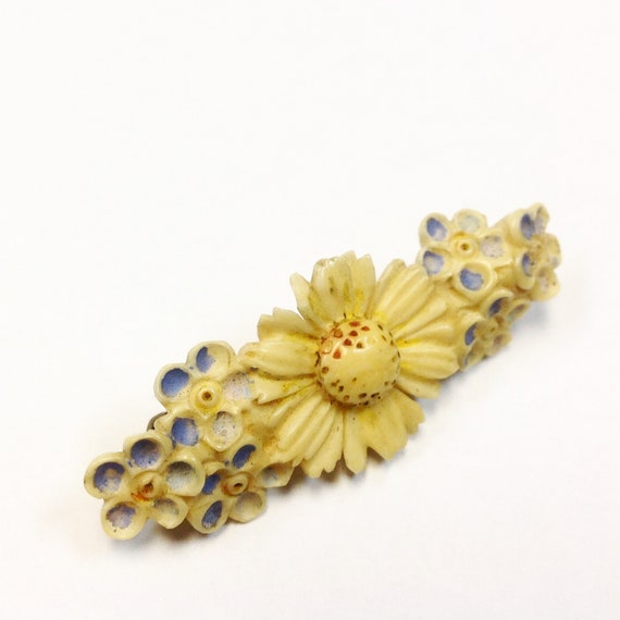 Vintage, 1930s to 1940s, carved celluloid, forget-