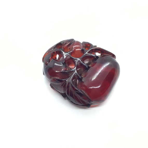 Vintage, cherry amber bakelite, Chinese carved che