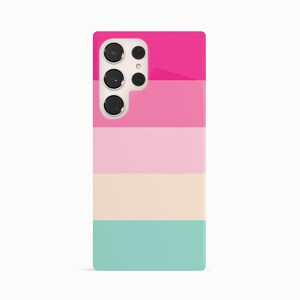 a pink, blue, and green phone case on a white background