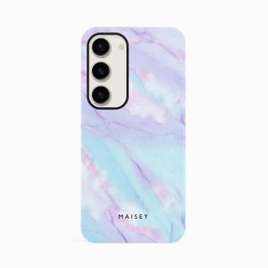 a purple and blue marble phone case with the name maisey on it
