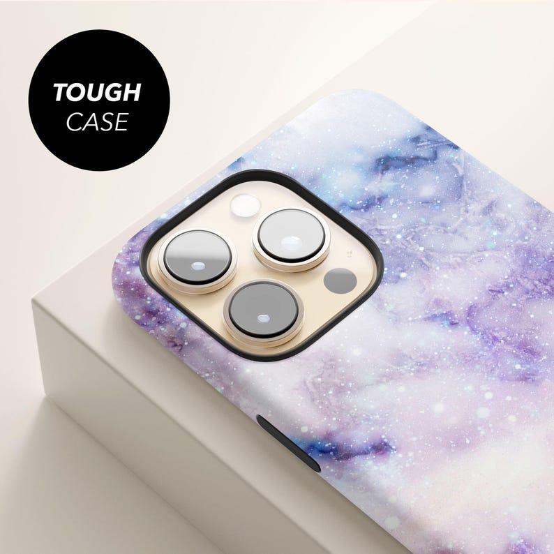 a phone case with three buttons on it