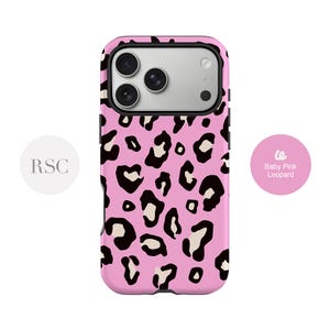 May include: A baby pink phone case featuring a black and white leopard print pattern. The case has a camera aperture at the top and the text "Baby Pink Leopard" on a pink circle.
