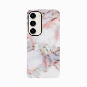 a white and pink marble phone case on a white background