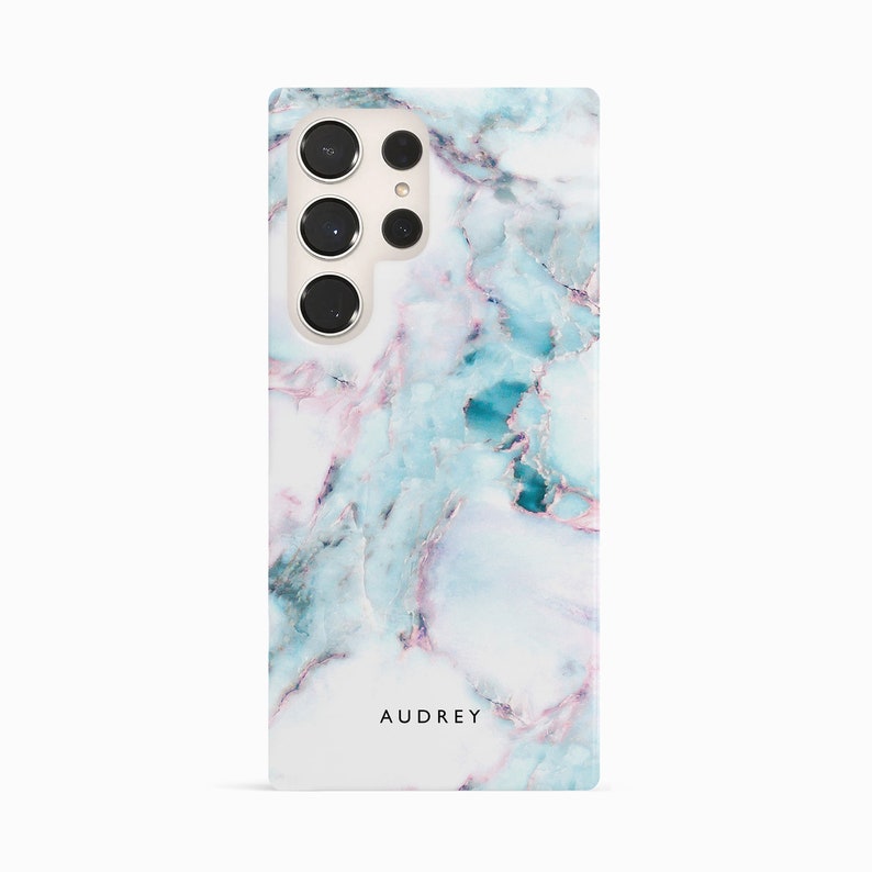 a white and blue phone case with a name on it