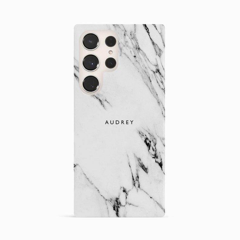 a white phone case with a black and white marble pattern