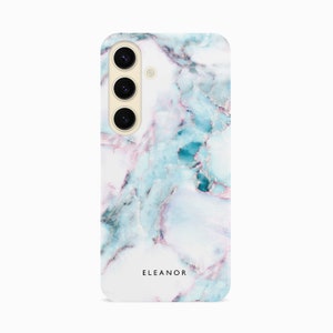 a white phone case with a blue and pink marble pattern