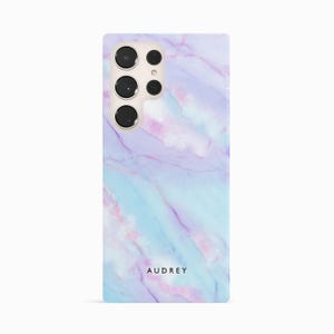 a white and blue phone case with a name on it