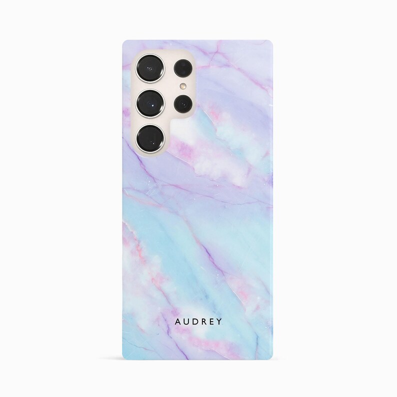 a white and blue phone case with a name on it