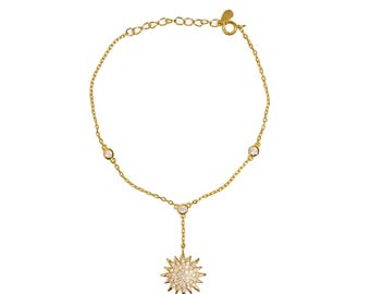 Bracelet de main style soleil en or et diamants