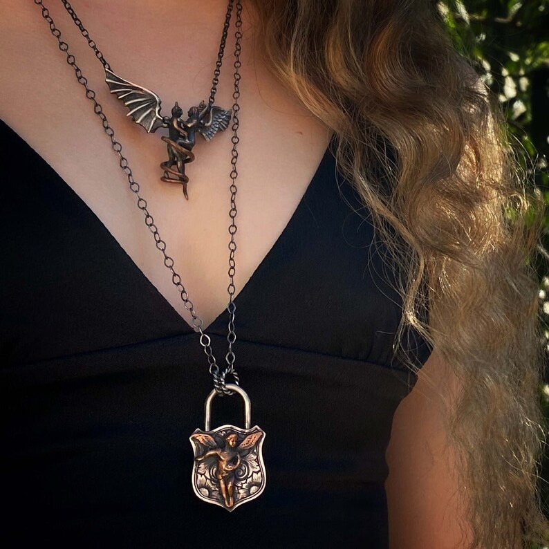 Model wearing Angel Lock Necklace - 925 Silver Rhodium-Plated Chain.