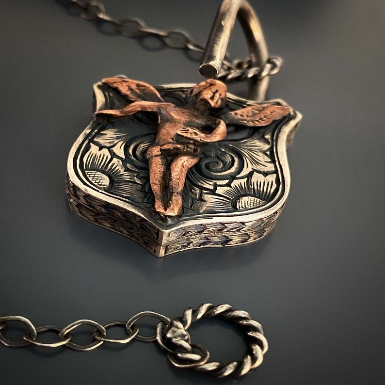 Intricate Silver Pendant - Lock and Angel Charm Necklace.
