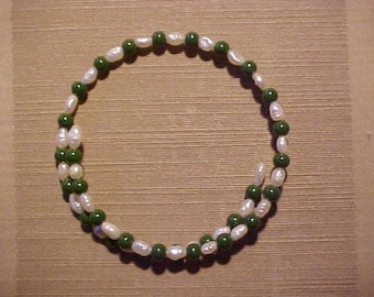 Bracciale a manetta in oro giallo 18kt e giada - Asta Gioielli Orologi | Fashion Vintage - Colasanti