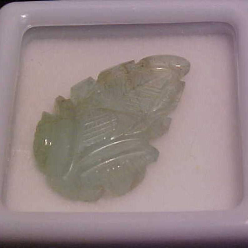 7.81 carats Carved Emerald Leaf FREE shipping in the United States. Native Cut 19 X 12 MM