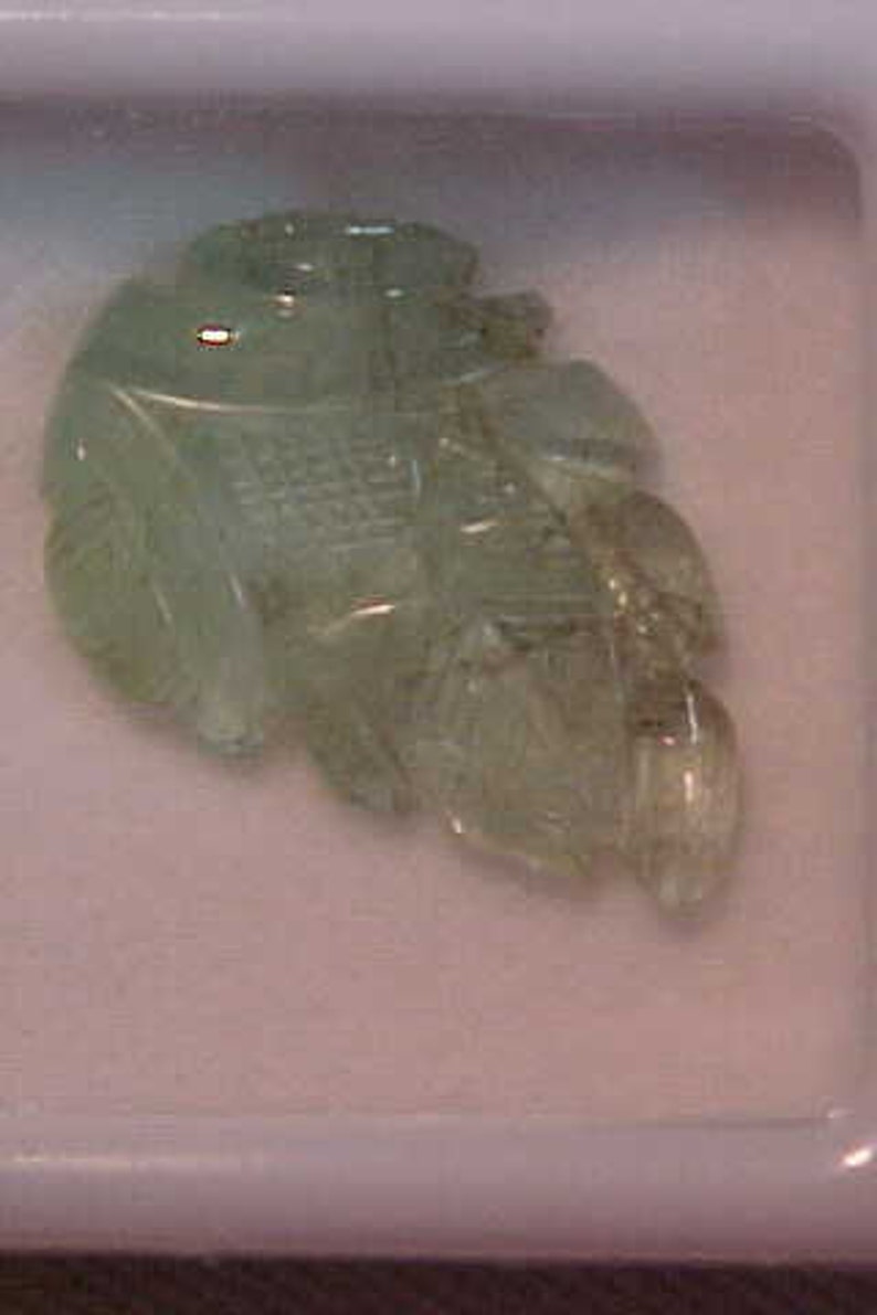 7.81 carats Carved Emerald Leaf FREE shipping in the United States. Native Cut 19 X 12 MM