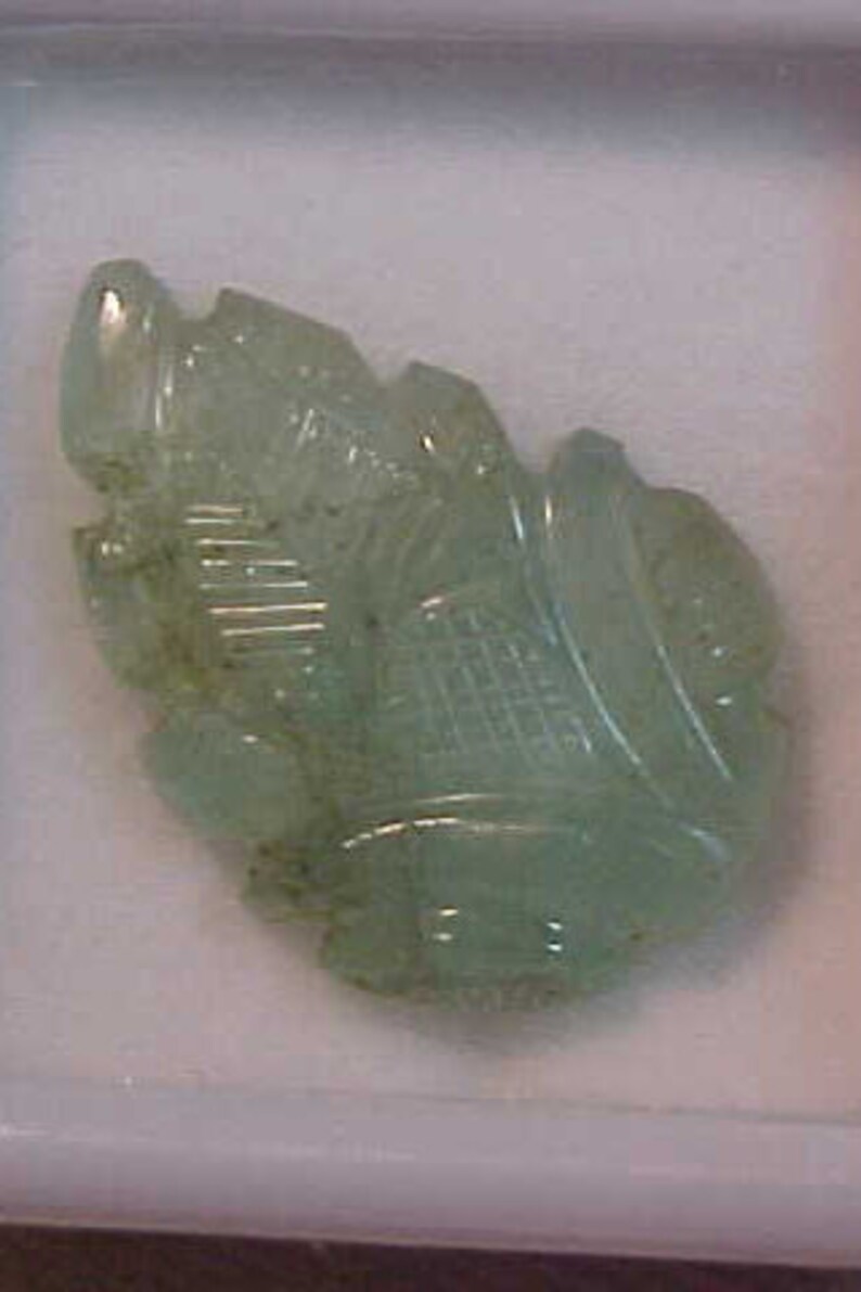 7.81 carats Carved Emerald Leaf FREE shipping in the United States. Native Cut 19 X 12 MM