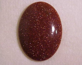 Large GOLDSTONE 24.1 carats, 22 X 30 MM.