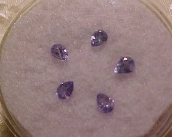 TANZANITE collection of 5, each 4X3 MM total weight  .95 carats.  FREE shipping in the United States.