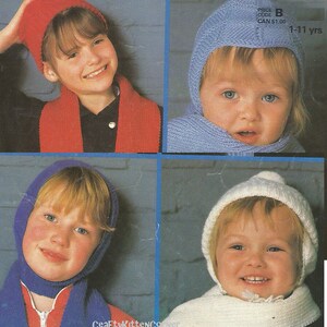 May include: Four children wearing different colored knitted hats and scarves. The hats are all variations of the same pattern, with a pointed top and a fold-down flap. The scarves are all long and narrow, and they are tied around the children's necks. The children are all smiling and looking at the camera.