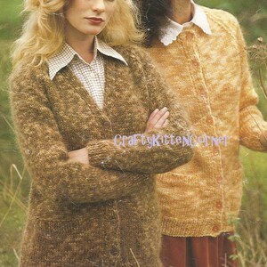 May include: Two women wearing knitted cardigans. One cardigan is a speckled brown, the other is a speckled yellow. Both cardigans have button closures and pockets. The woman on the left is wearing a collared shirt underneath.