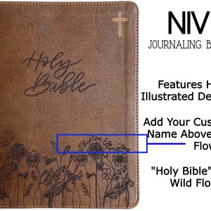 A New International Version Journaling by Zondervan Publishing in Tan. It has a design of Grass and Flowers engraved on it. It is hand lettered with calligraphy and makes a beautiful Christian gift, Gods Word, Scripture, 9780310455271