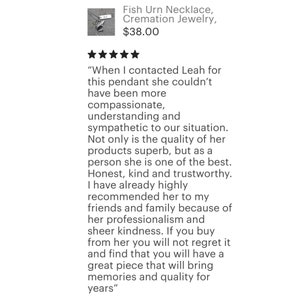 May include: A silver fish urn necklace, a cremation jewellery piece, with a five-star rating and a customer review praising the seller's compassion, understanding, and quality of products. The review mentions the seller's honesty, kindness, and trustworthiness.