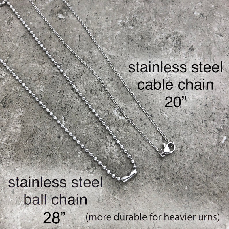 May include: Two stainless steel chains, one ball chain and one cable chain. The ball chain is 28 inches long and the cable chain is 20 inches long. The text "stainless steel ball chain 28" (more durable for heavier urns)" is below the ball chain and the text "stainless steel cable chain 20" is below the cable chain.