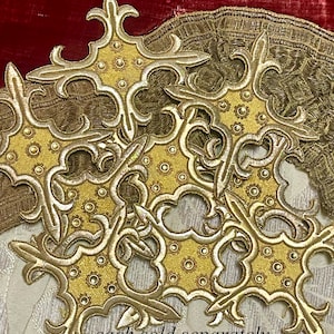 Applique métallique dorée vieillie