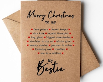 Può includere: Un biglietto marrone con il testo "Merry Christmas to my" e un elenco di motivi per cui qualcuno è un migliore amico, tra cui "fave person", "secret keeper", "side kick", "unpaid therapist", "hug giver", "biggest cheerleader", "shoulder to cry on", "advice giver", "memory creator", "partner in crime", "listening ear", "comedian" e "one in a million". Il biglietto dice anche "My Bestie" in grandi lettere nere.