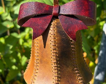 Antiqued Yellow Heritage Leather Jingle Bell Ornament with a Red Cordova Bow