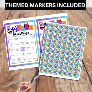 May include: Two sheets of 2000s Music Bingo cards with themed markers. The bingo cards have a colourful design with song titles and the text "THE 2000s Music Bingo". A sheet of matching stickers is also included.