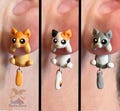 Handmade Cat Earrings - Polymer Clay – Cute Cat Stud Earrings with Flexible Plastic Post – Lightweight & Hypoallergenic – 9 Color Variations product logo