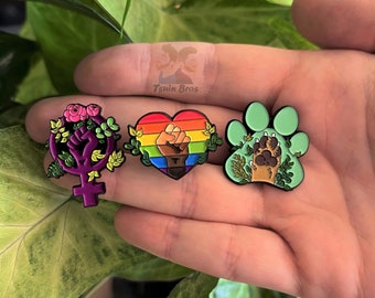 Equality pins: Feminism, Pride Progress and Animalism. Enamel pins.