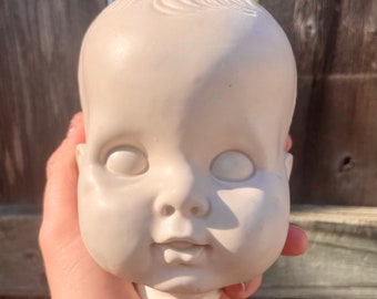 Baby Doll Head Piggy Bank