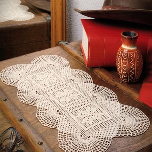 May include: An off-white rectangular crochet doily featuring three central square motifs with floral patterns and a scalloped edge. The text PDF File PATTERN is visible in the upper right corner of the image, indicating a digital design document.