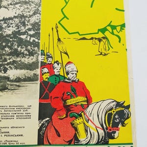 May include: A vintage book illustration depicts a man in a red coat riding a white horse, surrounded by figures in traditional attire. The background is yellow with green accents, and the book's edge has a green and white border.