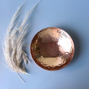 Medium Copper bowl with a hand stamped message around the rim Established 2018;. 7th Anniversary gift