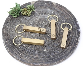 Porte-clés 19e anniversaire en bronze : métal massif, marques de pointage/infini