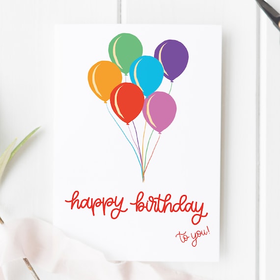 Biglietto di auguri bianco con stampa di palloncini colorati